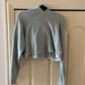 Alo cropped light blue hoodie.